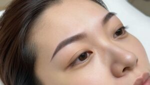 Close-up, photorealistic view of a woman with softly defined permanent makeup eyebrows in a calm, elegant Saint Charles spa setting, with natural lighting, no text, no logos, and no recognizable face